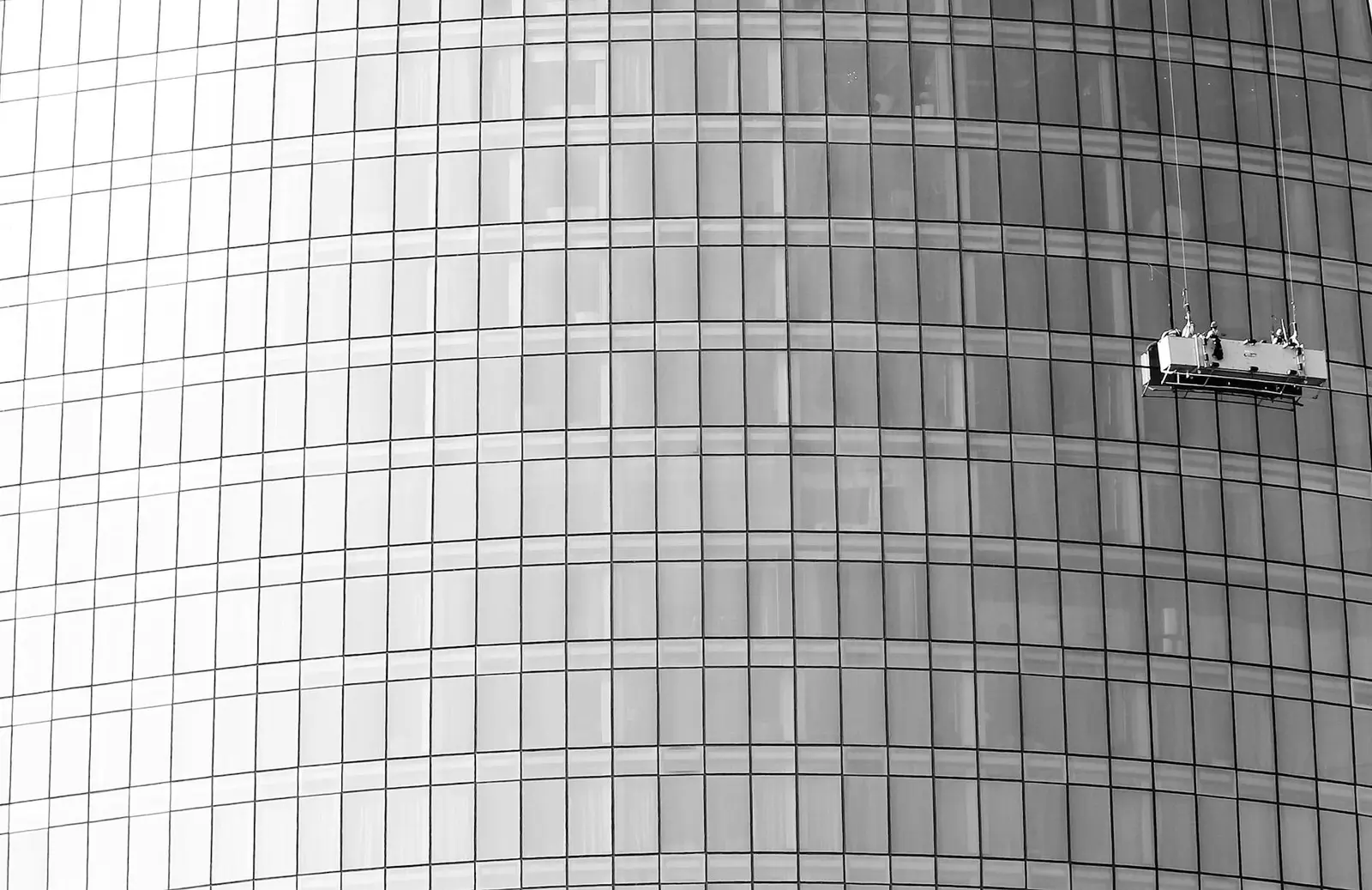 Specialist cleaning a high-rise window